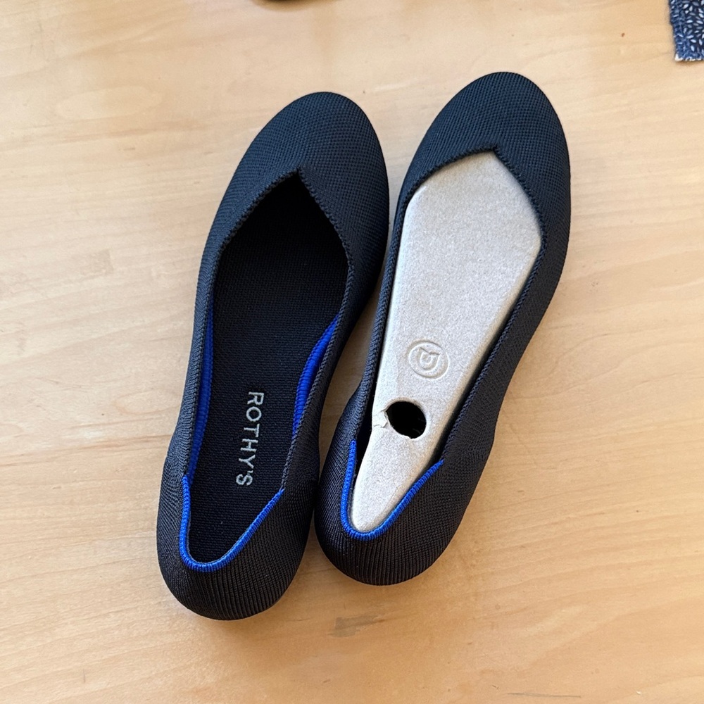 Rothy's Black Loafers with Vibrant Blue Accent